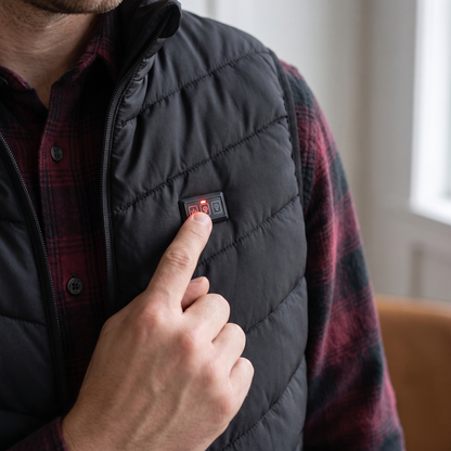 Pressing the control button on the Northwarm heated vest